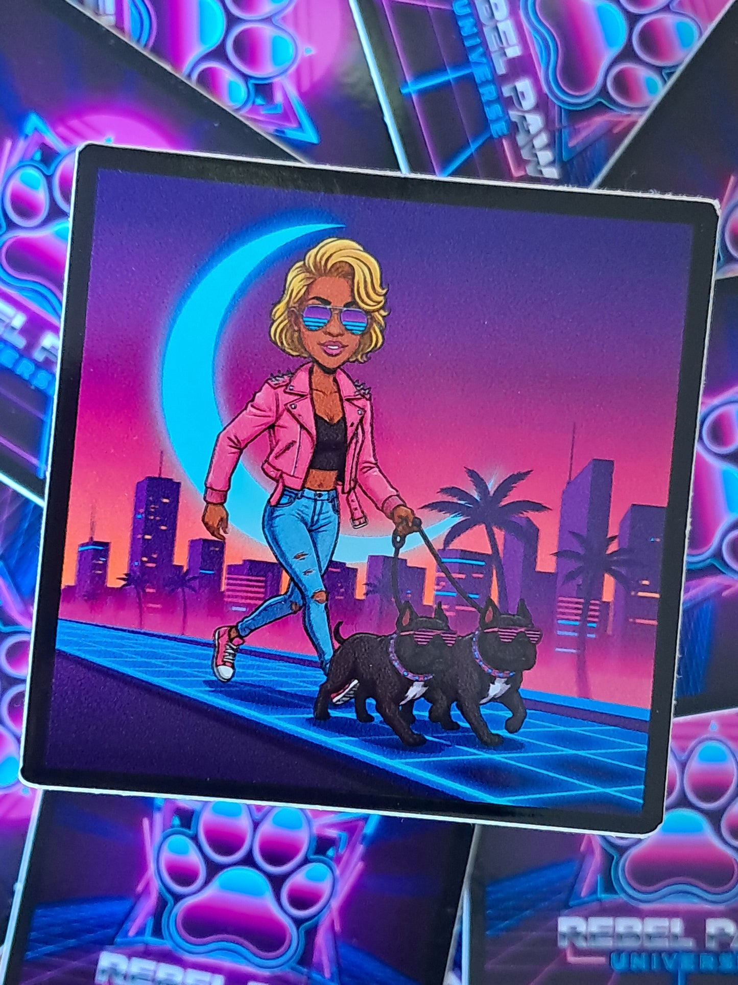 Woman in a pink jacket walking two dogs with a futuristic cityscape and moon in the background. Rebel Paw Universe. Sticker